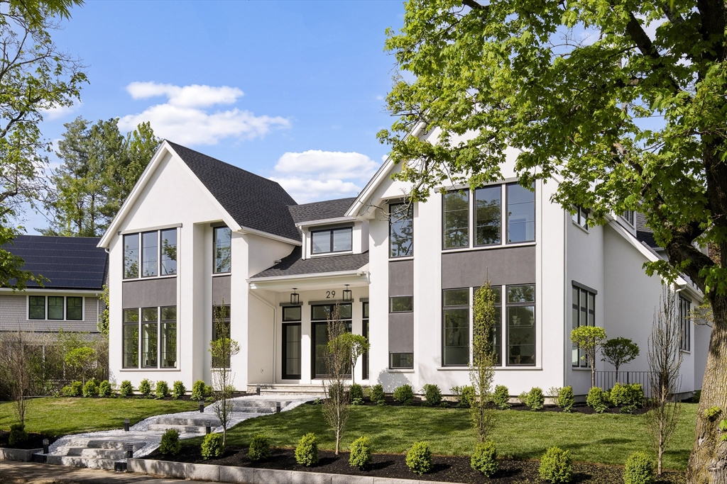 front view of a house with a yard