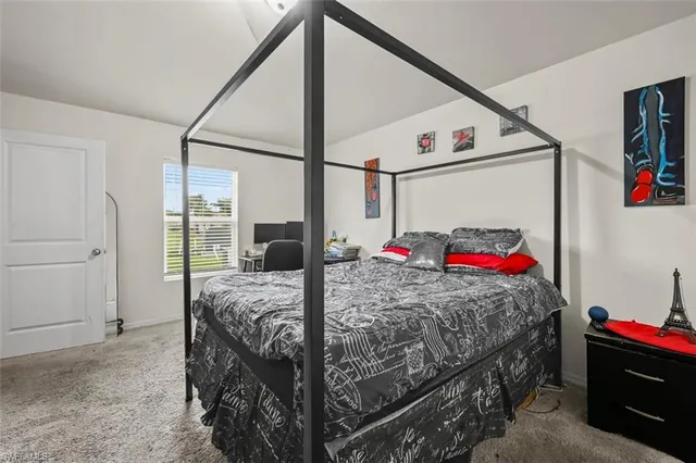 a bedroom with a bed and a closet