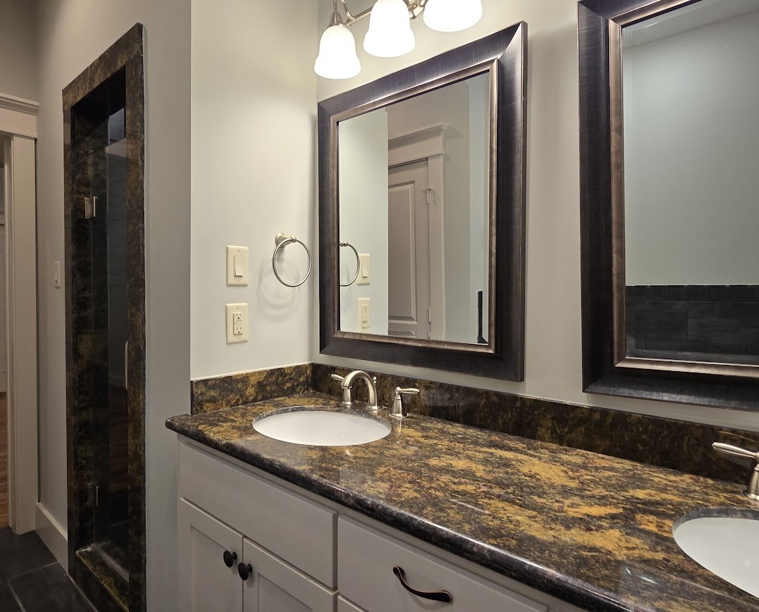 4109 Allen Street Houston, TX 77007 - Photo 33 of 42 Beautiful granite countertops, double sinks and bright vanity lighting in the primary bathroom.