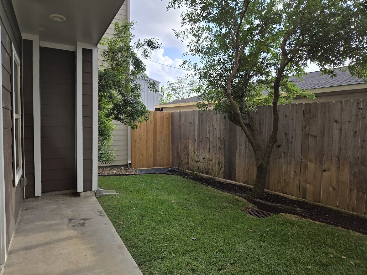 4109 Allen Street Houston, TX 77007 - Photo 40 of 42 Patio area connected to the 1st floor bedroom. Enjoy your evenings relaxing in your fenced-in backyard.