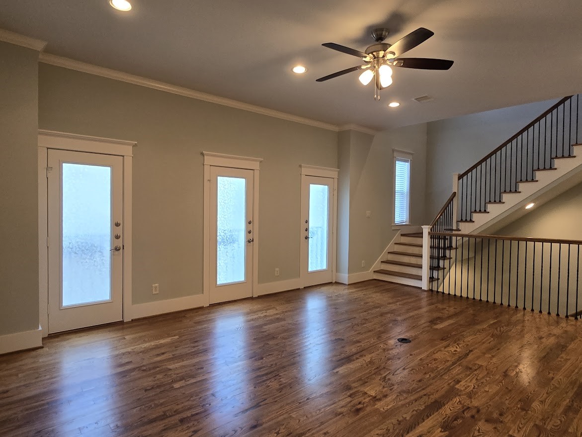 4109 Allen Street Houston, TX 77007 - Photo 9 of 42 Huge living room with tons of natural lighting. Three doors that open up to Juliet balconies.