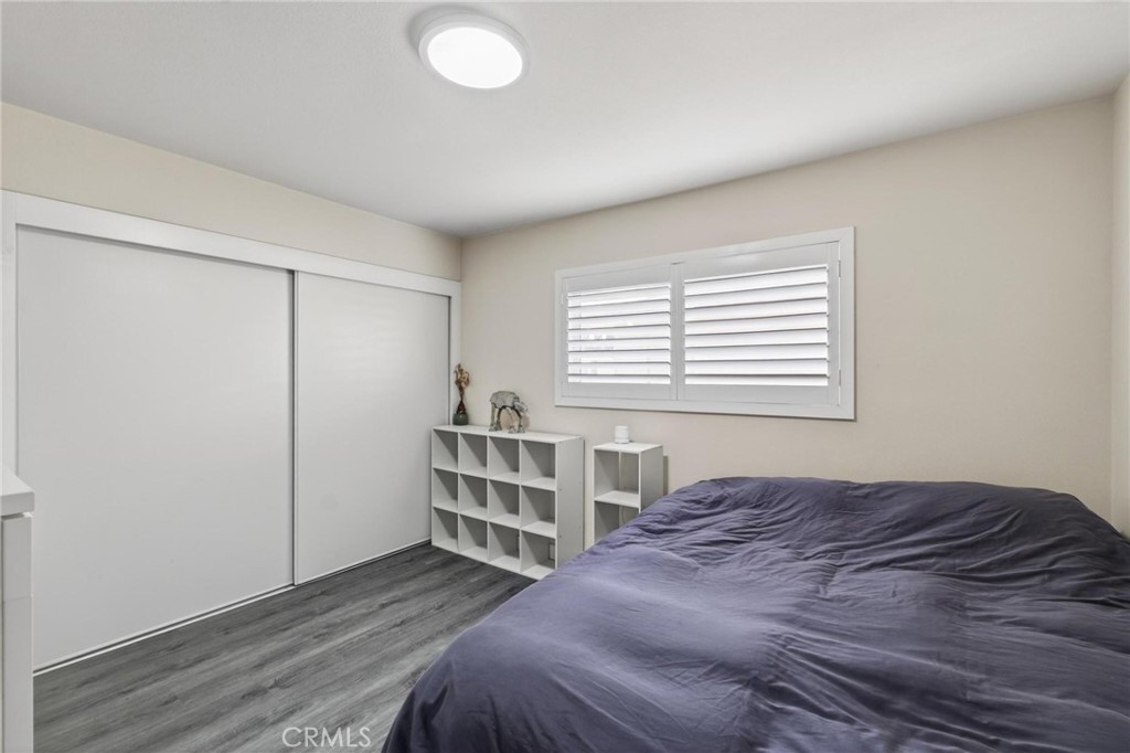910 East Meadbrook Street Carson, CA 90746 - Photo 31 of 39 a bedroom with a bed and a window