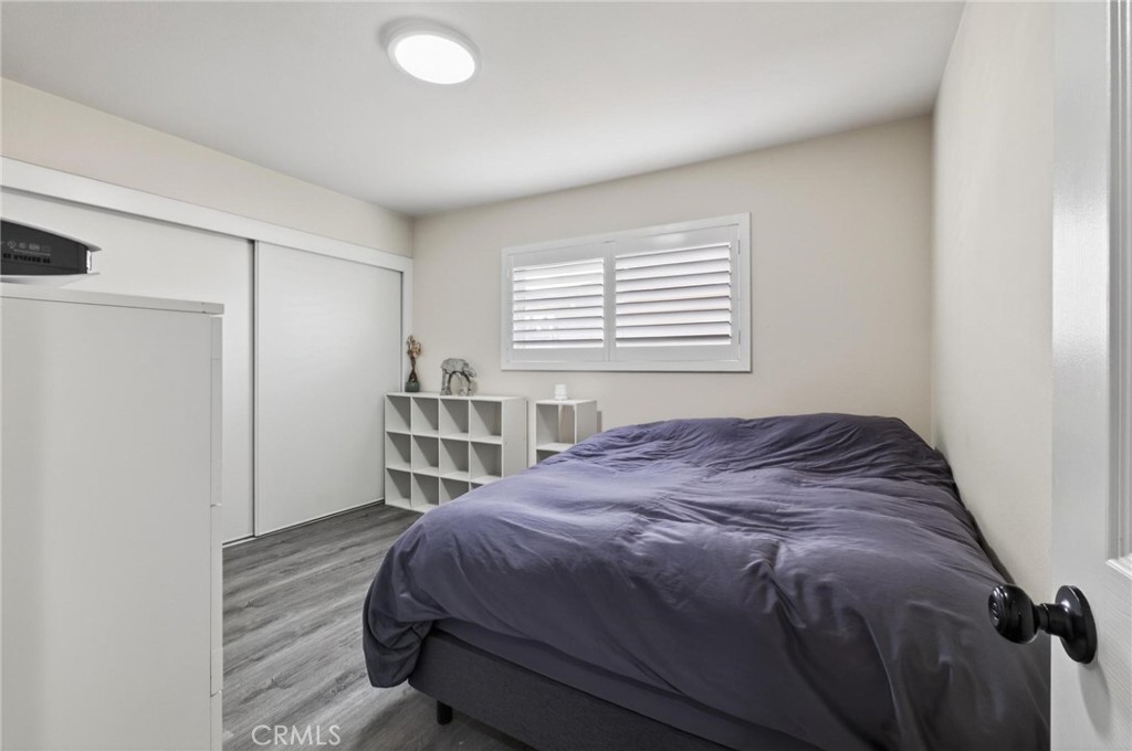 910 East Meadbrook Street Carson, CA 90746 - Photo 33 of 39 a bedroom with a bed and a window