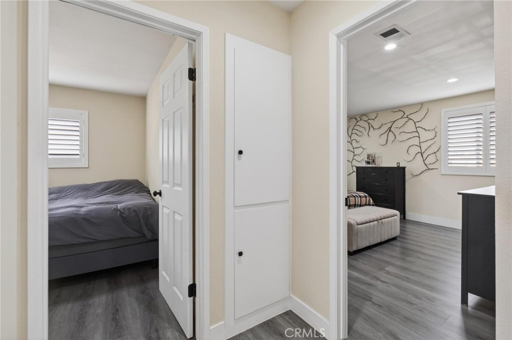 910 East Meadbrook Street Carson, CA 90746 - Photo 34 of 39 a bedroom with a bed and a couch