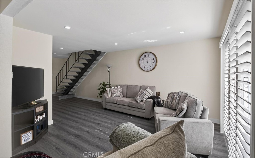 910 East Meadbrook Street Carson, CA 90746 - Photo 7 of 39 a living room with furniture and a flat screen tv