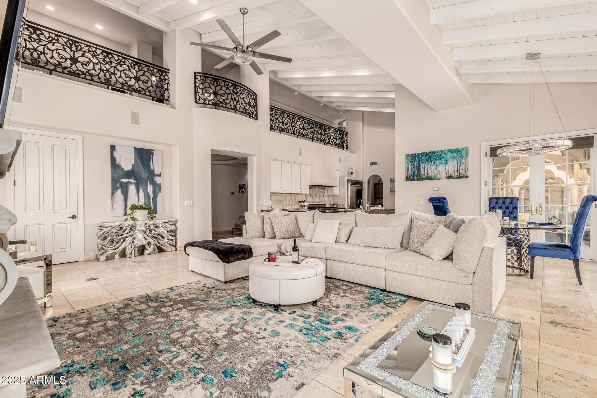 6050 North Paradise View Drive Paradise Valley, AZ 85253 - Photo 14 of 79 a living room with furniture and a chandelier