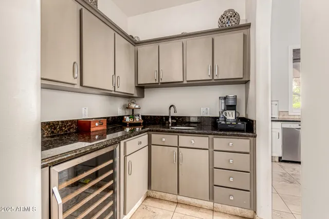 a large bathroom with a double vanity sink and a mirror