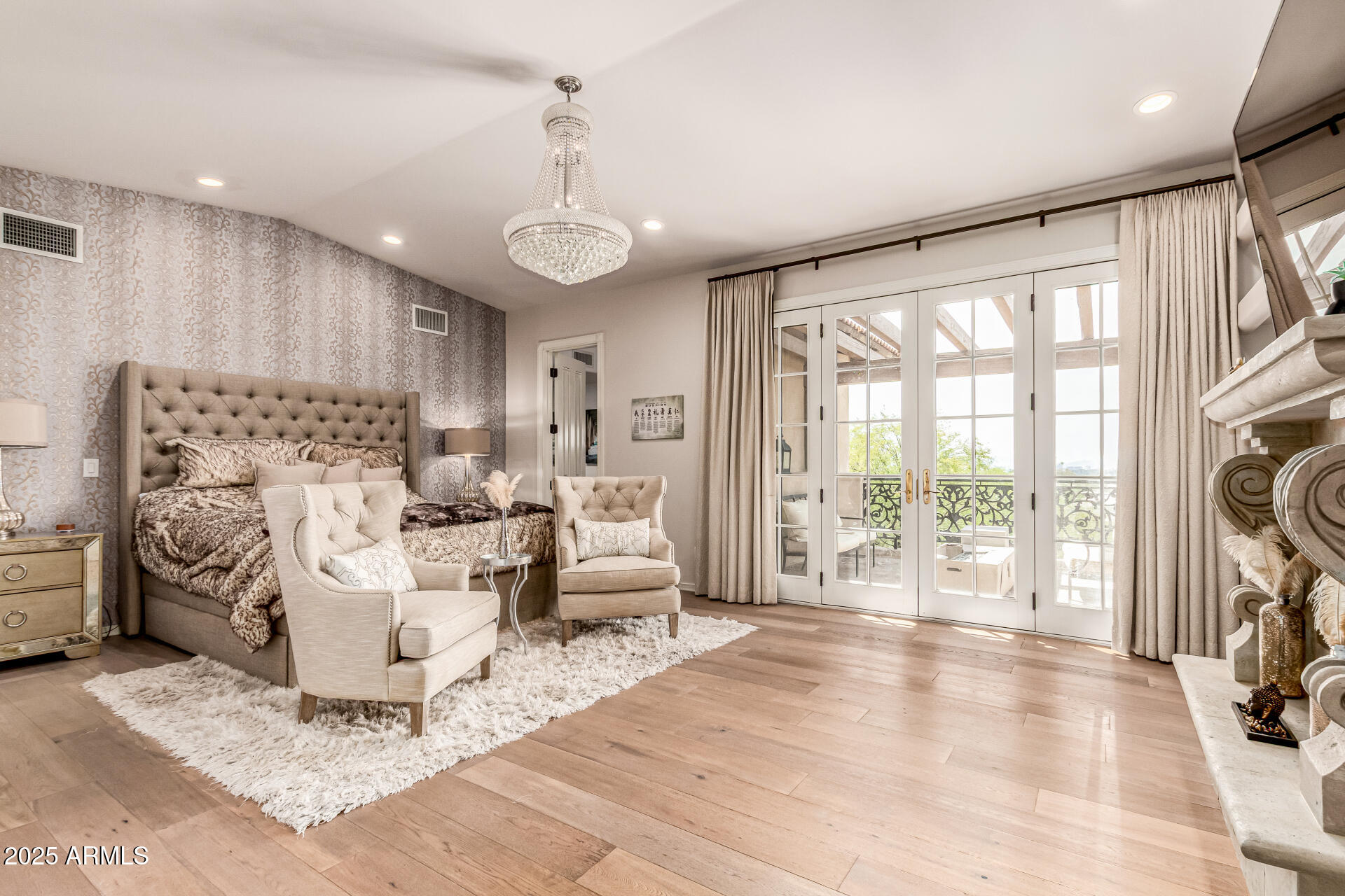 6050 North Paradise View Drive Paradise Valley, AZ 85253 - Photo 25 of 79 a living room with furniture a large window and a fireplace