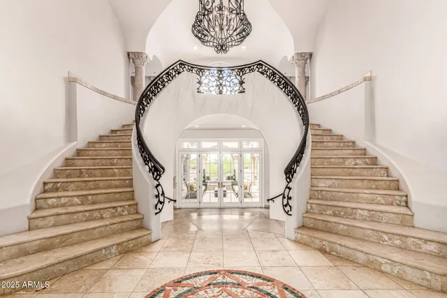 a view of a livingroom with furniture and front door