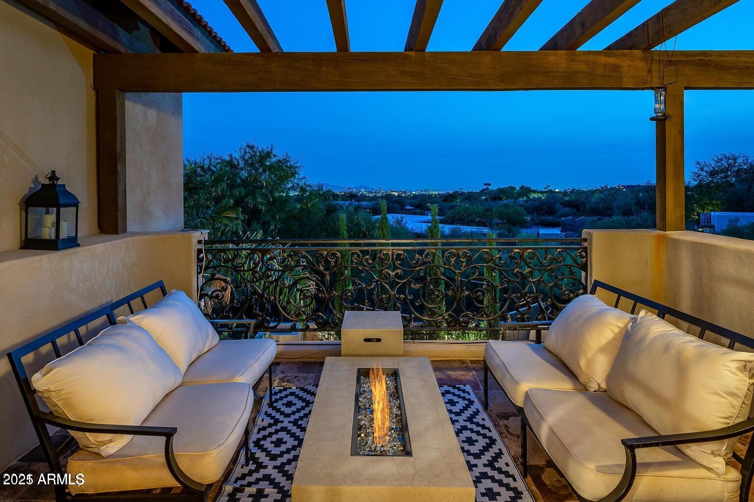 6050 North Paradise View Drive Paradise Valley, AZ 85253 - Photo 29 of 79 a living room with furniture and a floor to ceiling window