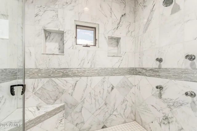 a bathroom with a sink and a shower