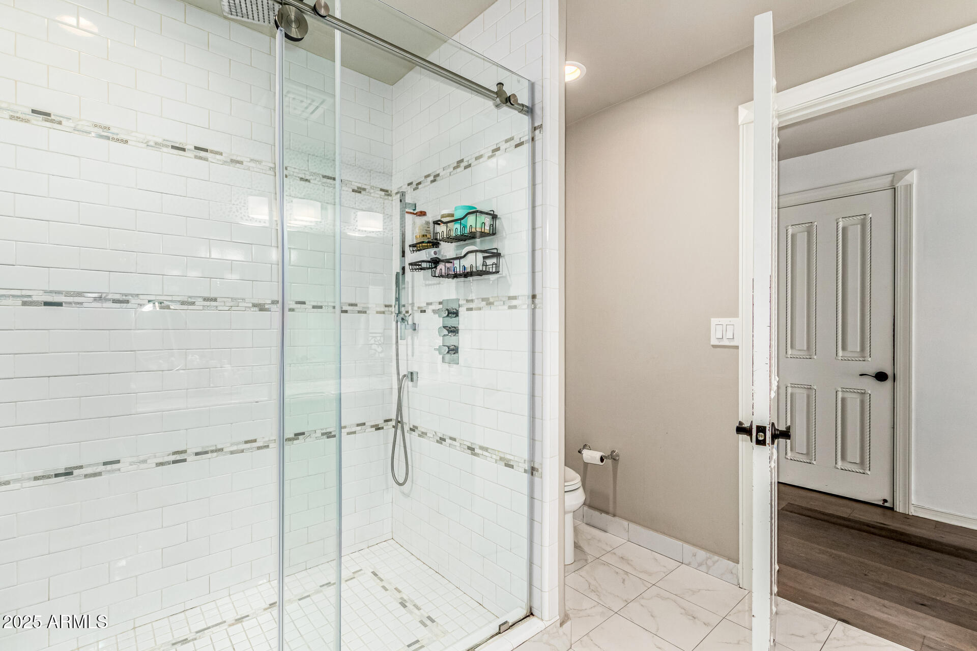 6050 North Paradise View Drive Paradise Valley, AZ 85253 - Photo 42 of 79 a bathroom with a glass shower door and a bathtub