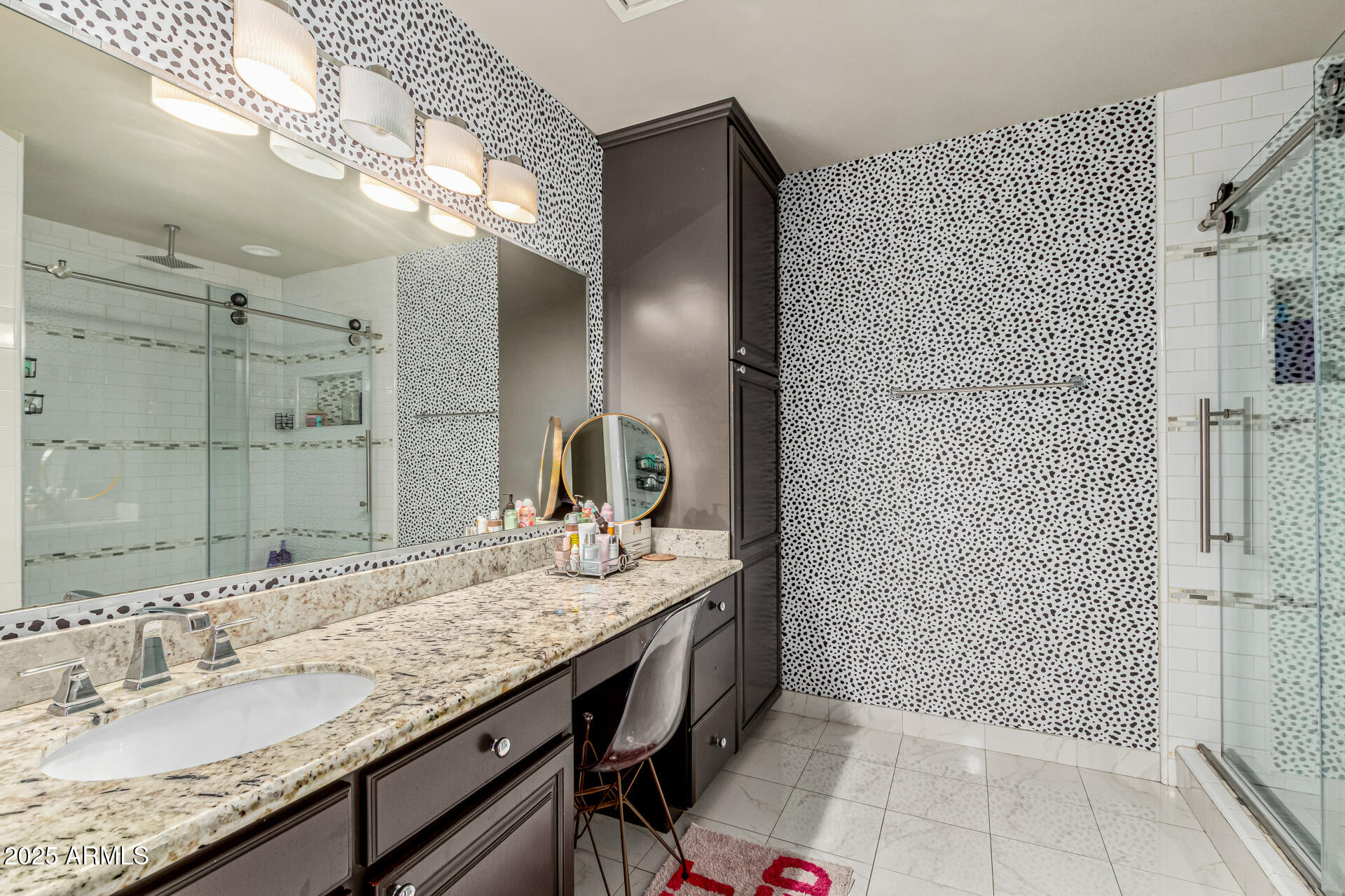 6050 North Paradise View Drive Paradise Valley, AZ 85253 - Photo 43 of 79 a bathroom with a granite countertop sink and a mirror