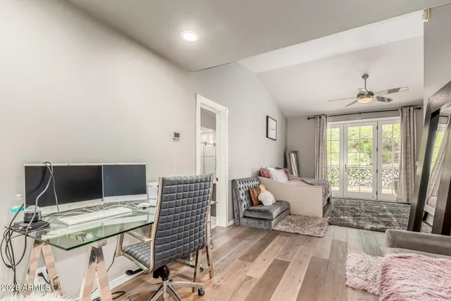 a view of a kitchen with sink and cabinets