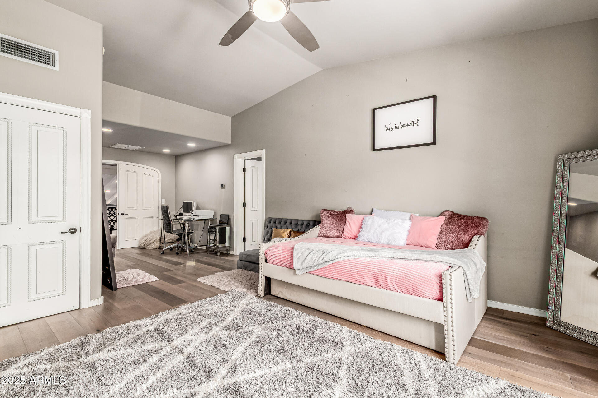 6050 North Paradise View Drive Paradise Valley, AZ 85253 - Photo 46 of 79 a living room with a bed furniture and a window