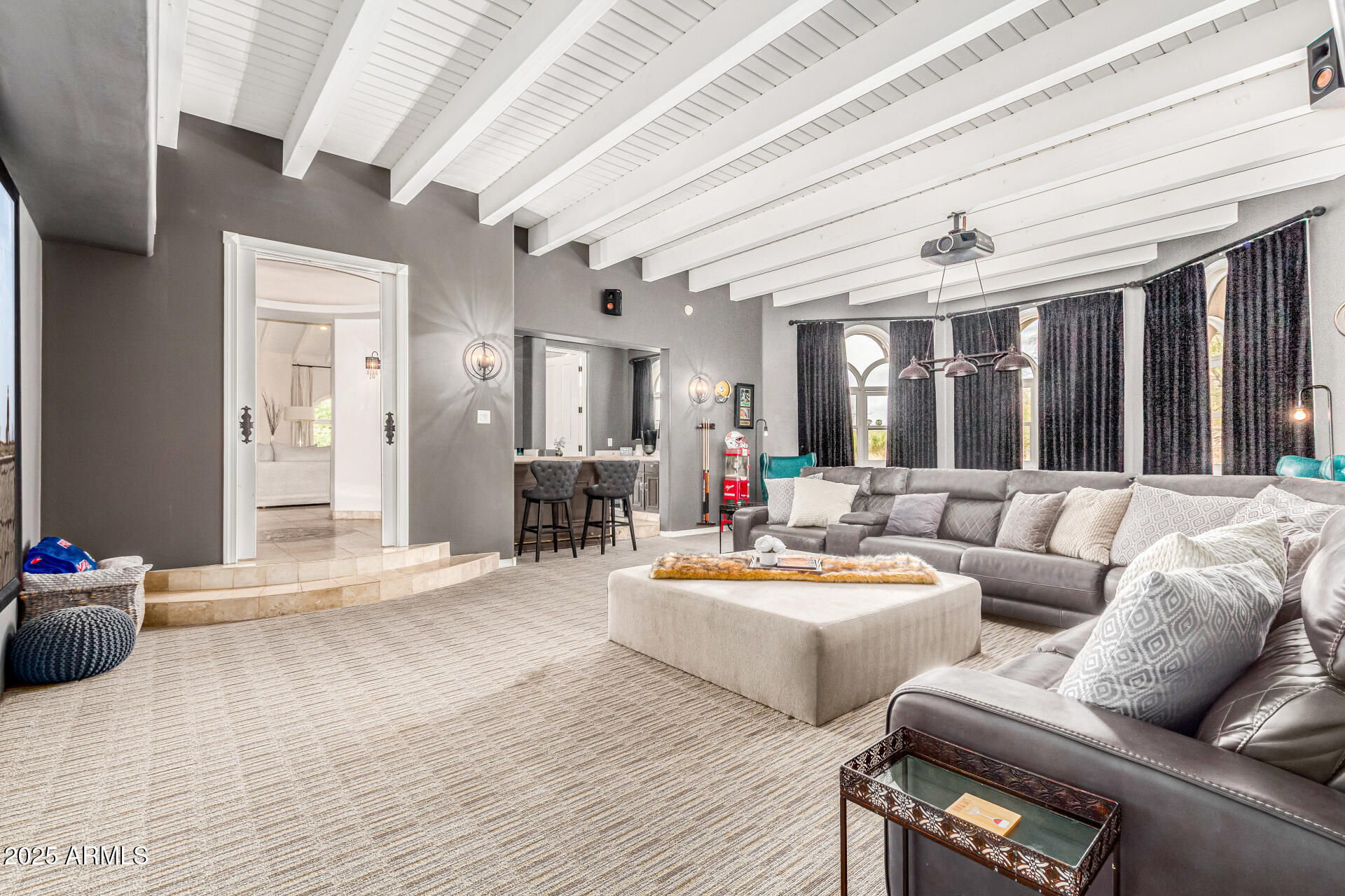 6050 North Paradise View Drive Paradise Valley, AZ 85253 - Photo 55 of 79 a living room with furniture and wooden floor