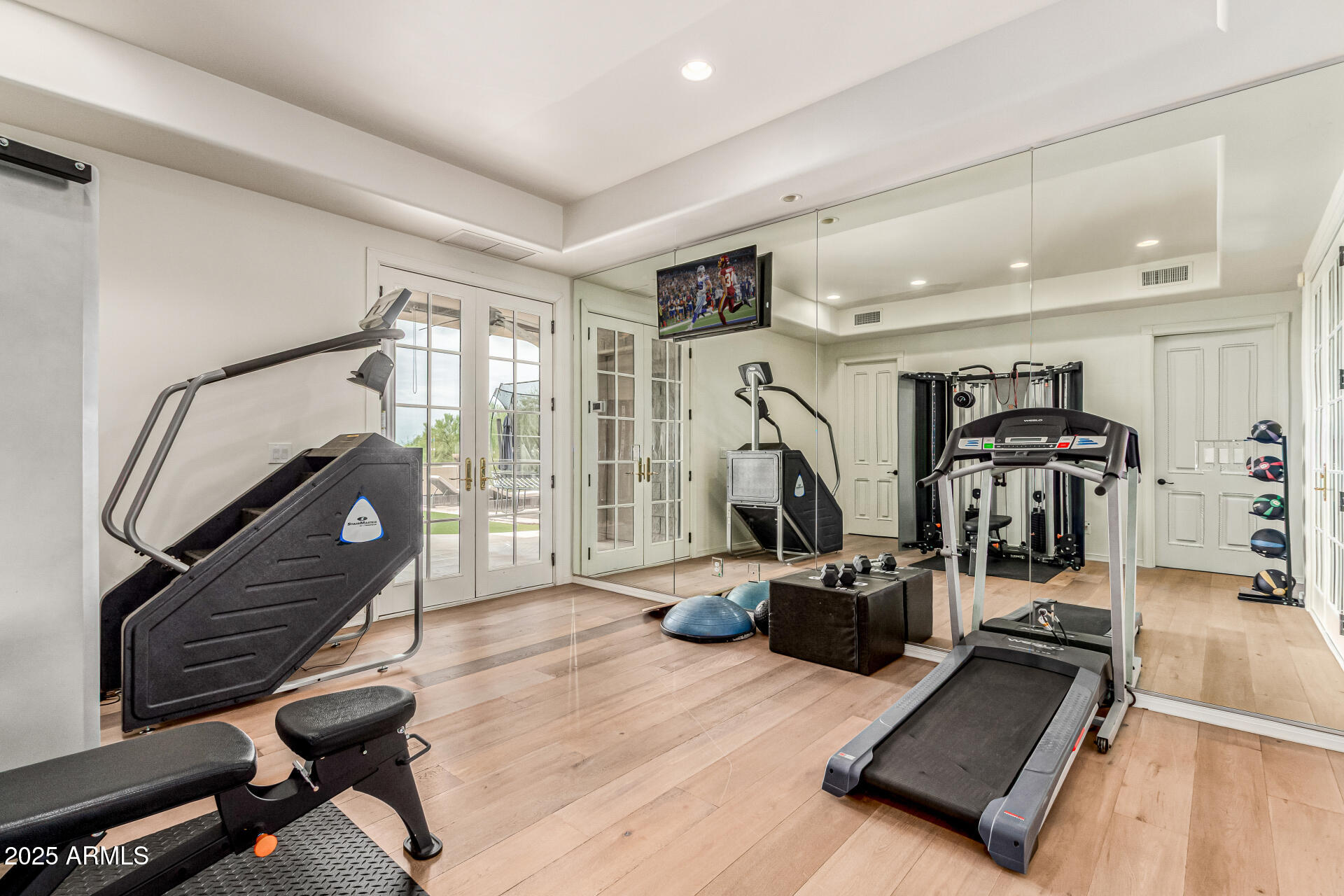 6050 North Paradise View Drive Paradise Valley, AZ 85253 - Photo 60 of 79 a view of a room with gym equipment