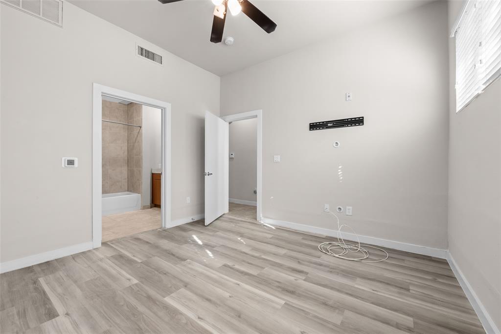 6927 Sumner Street, Unit 6927 The Colony, TX 75056 - Photo 16 of 22 wooden floor in an empty room