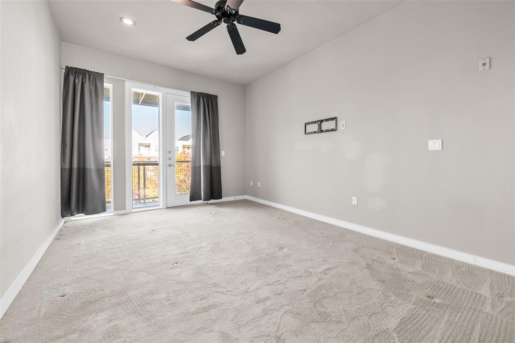 6927 Sumner Street, Unit 6927 The Colony, TX 75056 - Photo 10 of 22 a view of an empty room with a window