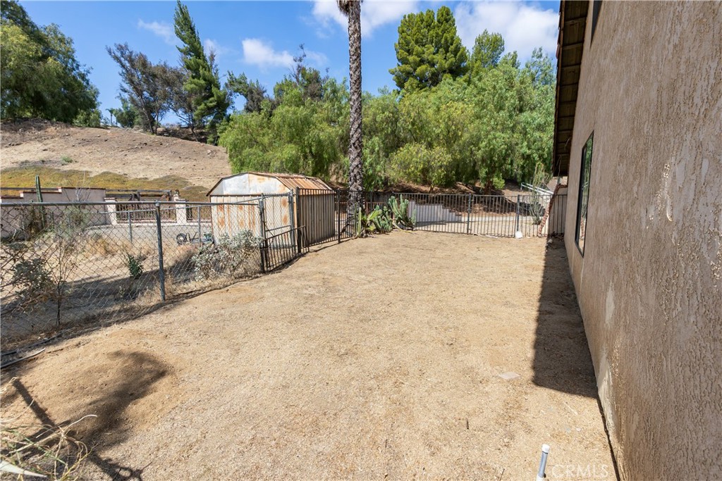 17656 Mockingbird Hill Circle Riverside, CA 92504 - Photo 32 of 49 a view of a backyard with sitting area