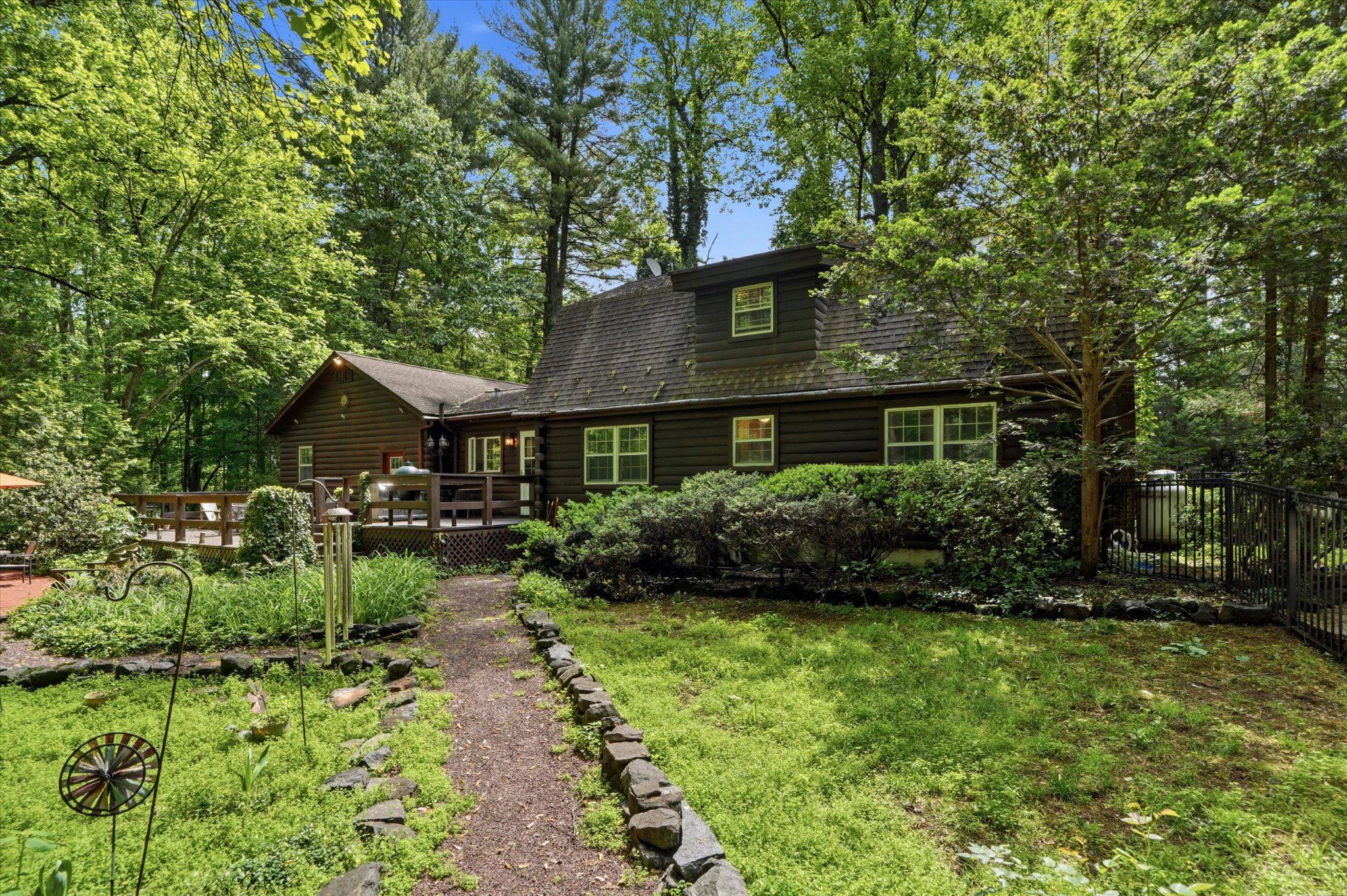 607 Kulp Road Perkiomenville, PA 18074 - Photo 29 of 39 Charming retreat nestled in lush greenery.