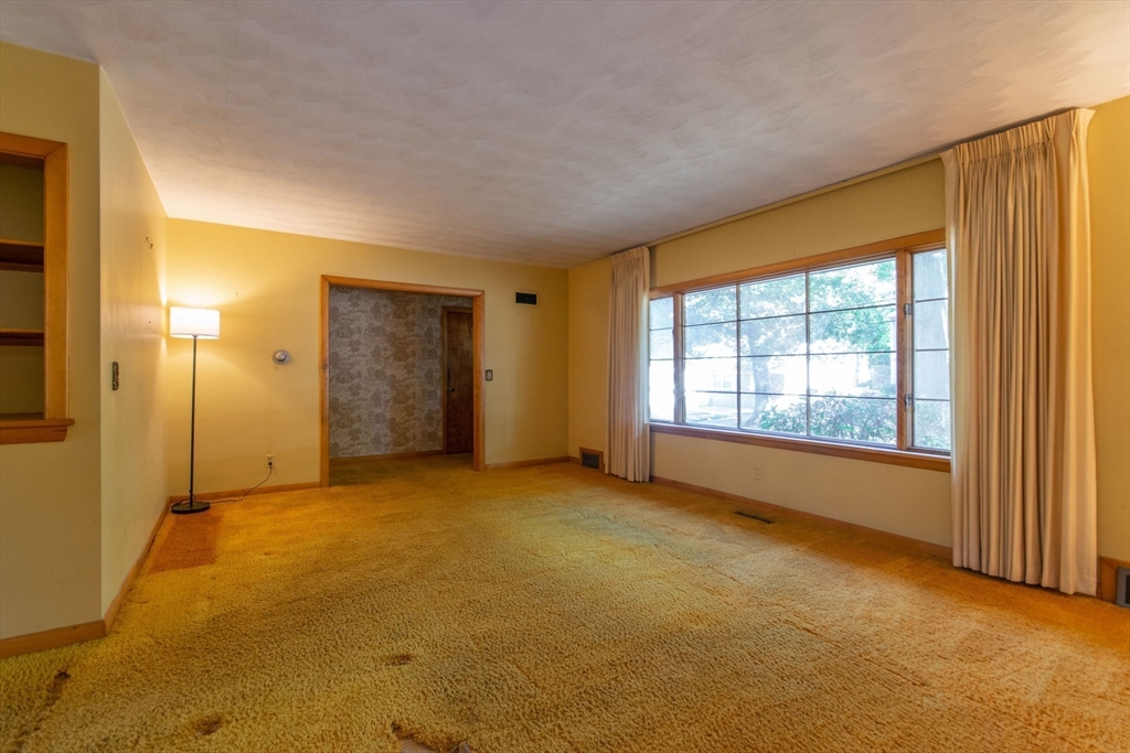 182 Dayton Street Springfield, MA 01118 - Photo 11 of 30 a view of an empty room with a window