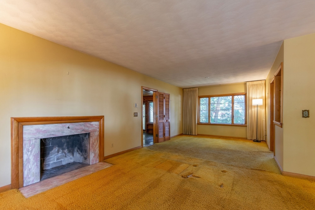 182 Dayton Street Springfield, MA 01118 - Photo 13 of 30 a view of empty room with a fireplace