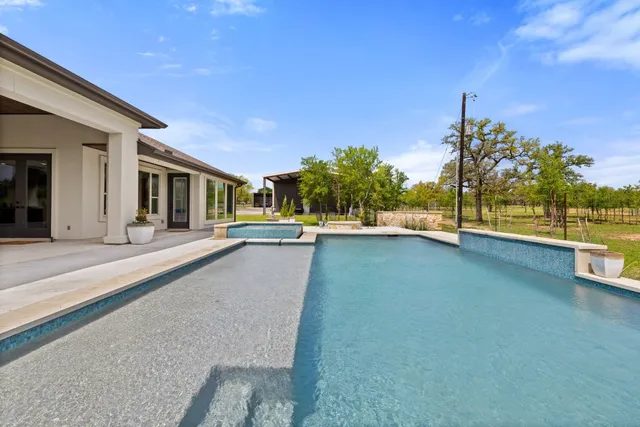 a view of a building with a swimming pool