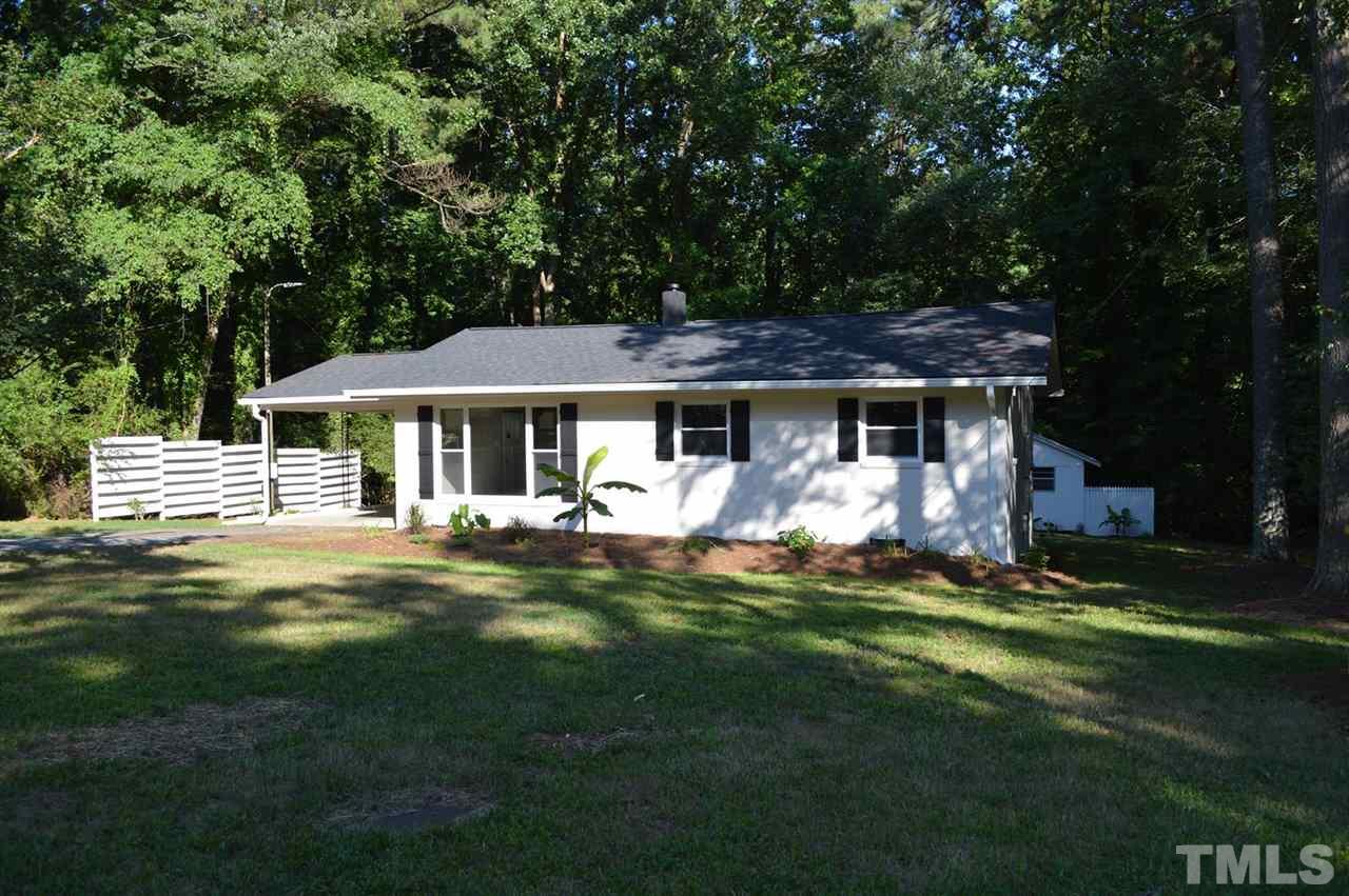 110 Nancy Rhodes Drive Durham, NC 27712 - Photo 2 of 24 a front view of a house with a garden