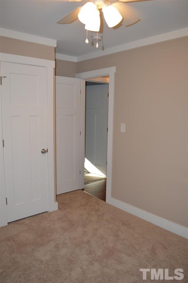 110 Nancy Rhodes Drive Durham, NC 27712 - Photo 18 of 24 a view of an empty room and window