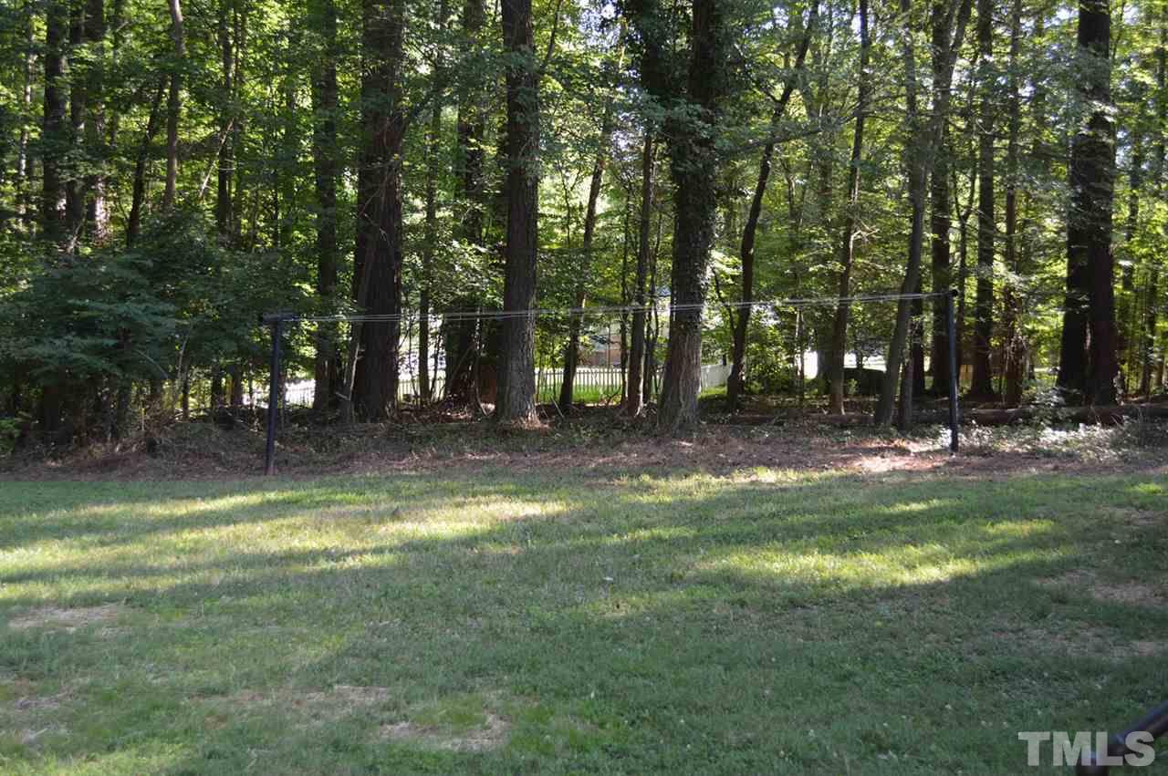 110 Nancy Rhodes Drive Durham, NC 27712 - Photo 7 of 24 a view of outdoor space with trees all around