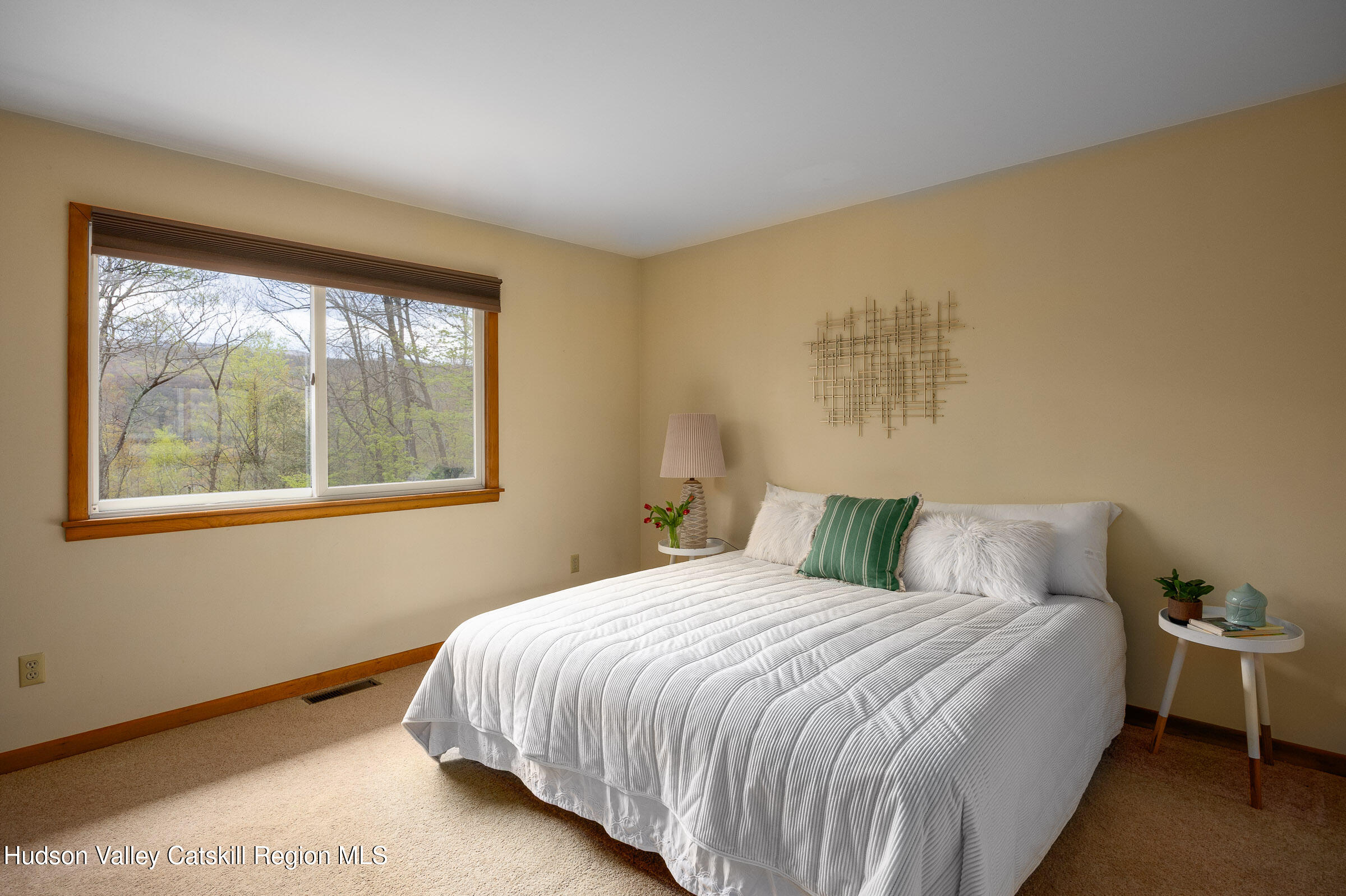 170 Macdaniel Road Woodstock, NY 12498 - Photo 14 of 33 a bedroom with a bed and a window