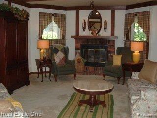1875 Jenny Lane, Unit 249 Rochester, MI 48309 - Photo 3 of 24 Lg. LR with fireplace