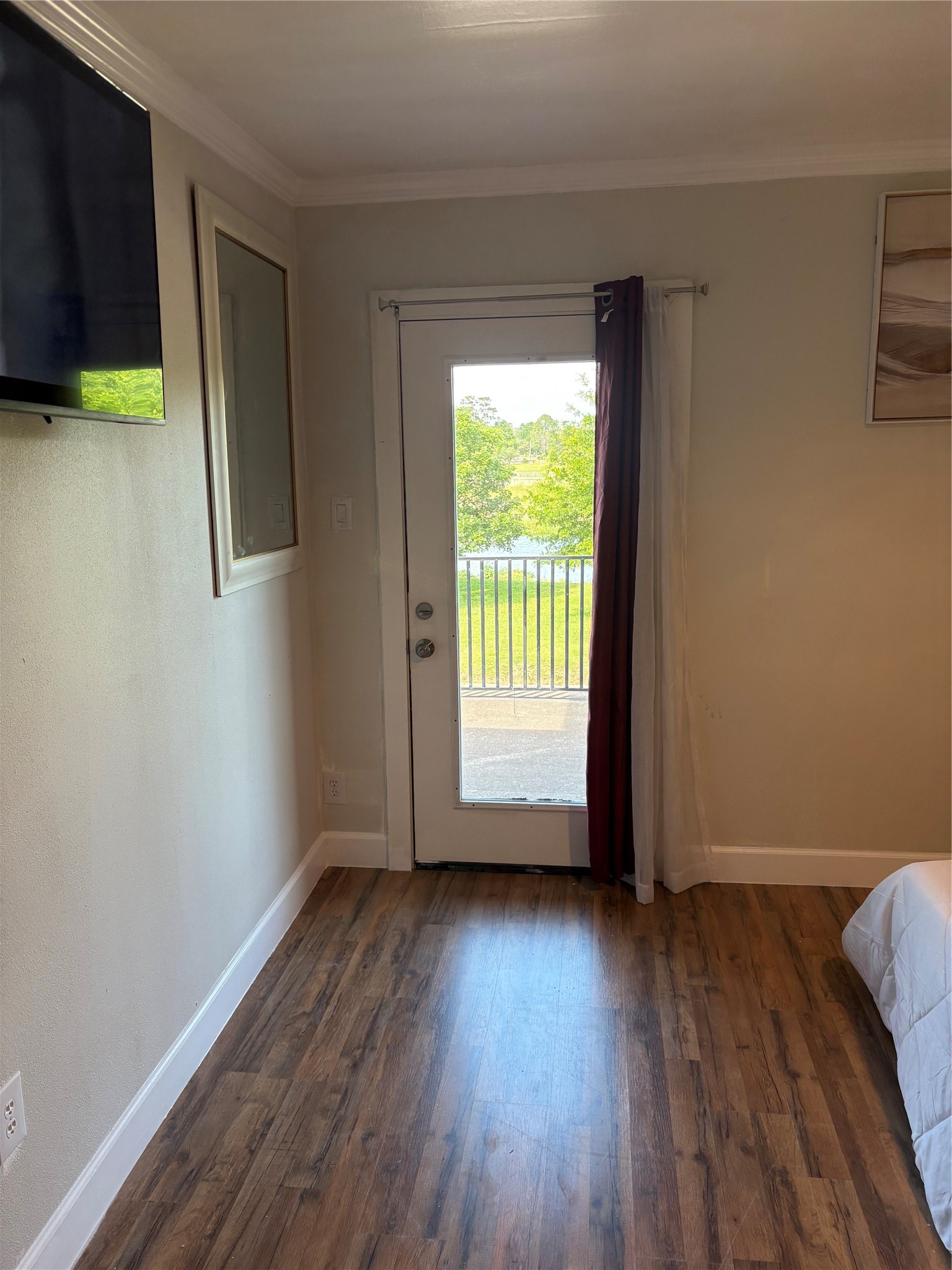 1820 North MacGregor Way Houston, TX 77023 - Photo 32 of 35 a view of room with window and wooden floor