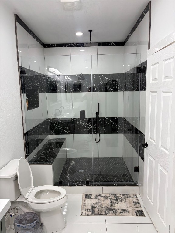 1820 North MacGregor Way Houston, TX 77023 - Photo 34 of 35 a bathroom with a toilet a sink and a shower