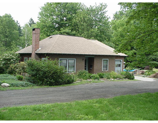 3 Matoon Street Amherst, MA 01002 - Photo 1 of 1 a aerial view of a house with a yard and potted plants