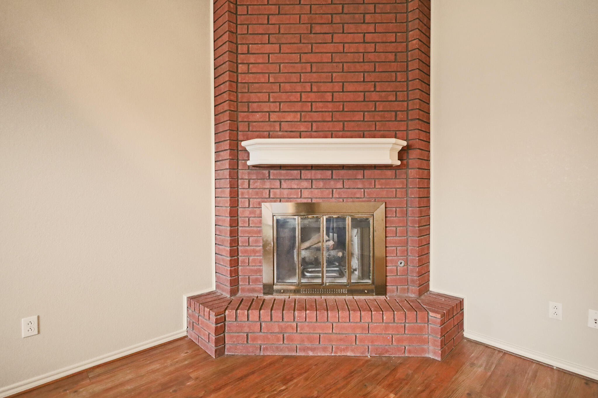 2214 94th Street Lubbock, TX 79423 - Photo 12 of 41 a living room with a fireplace