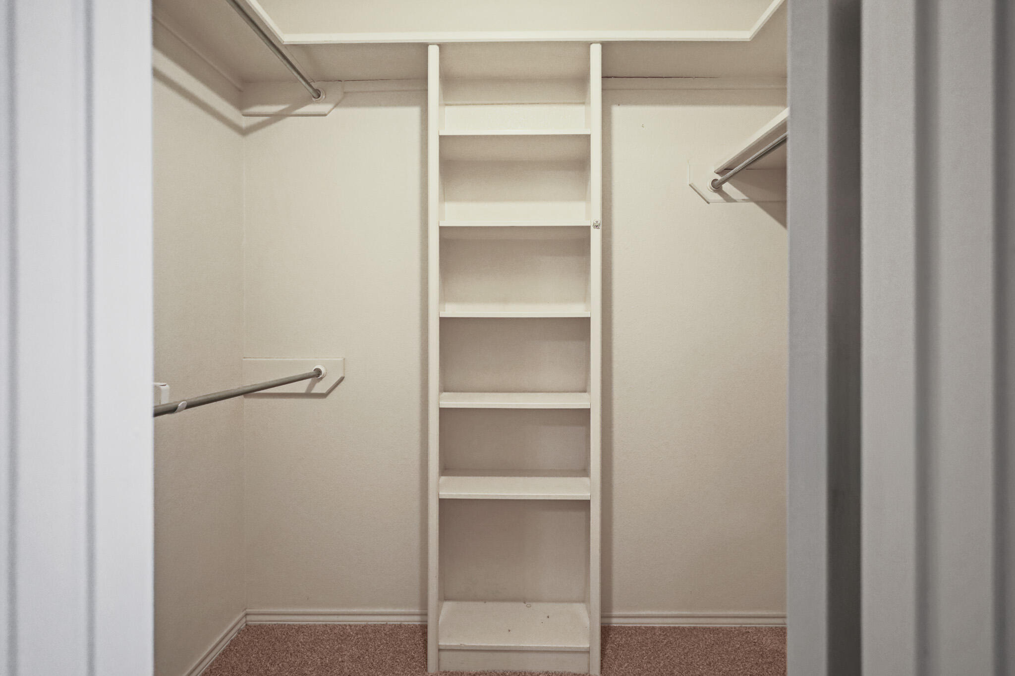 2214 94th Street Lubbock, TX 79423 - Photo 26 of 41 a view of an empty walk in closet