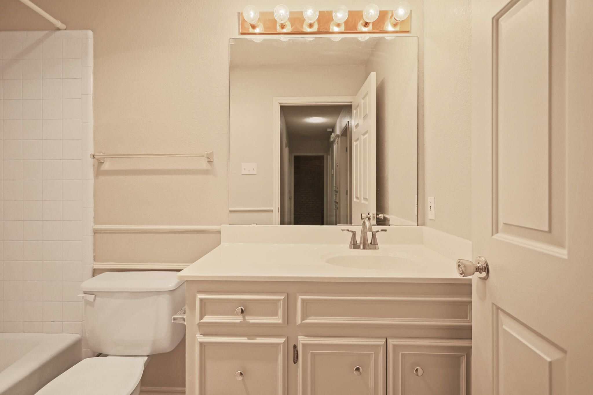 2214 94th Street Lubbock, TX 79423 - Photo 36 of 41 a bathroom with a sink and a toilet
