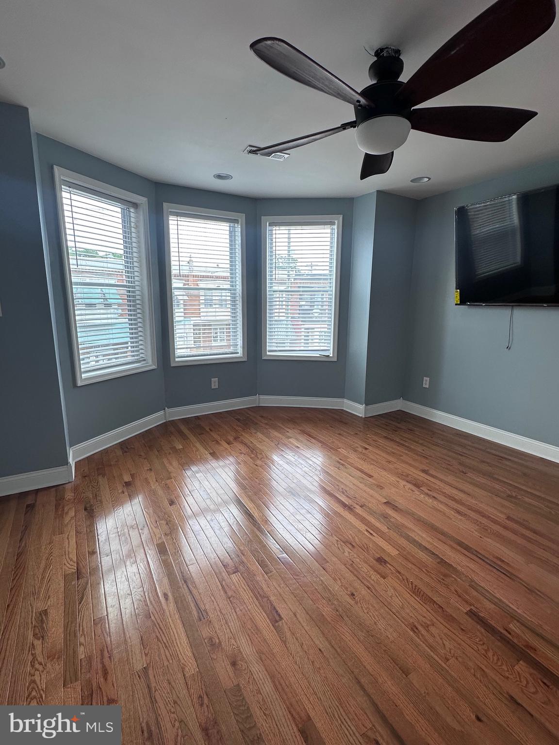 5254 Jefferson Street Philadelphia, PA 19131 - Photo 30 of 30 a view of an empty room with wooden floor and a window
