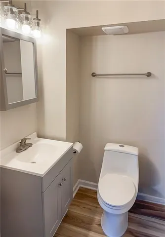 a bathroom with a sink and toilet