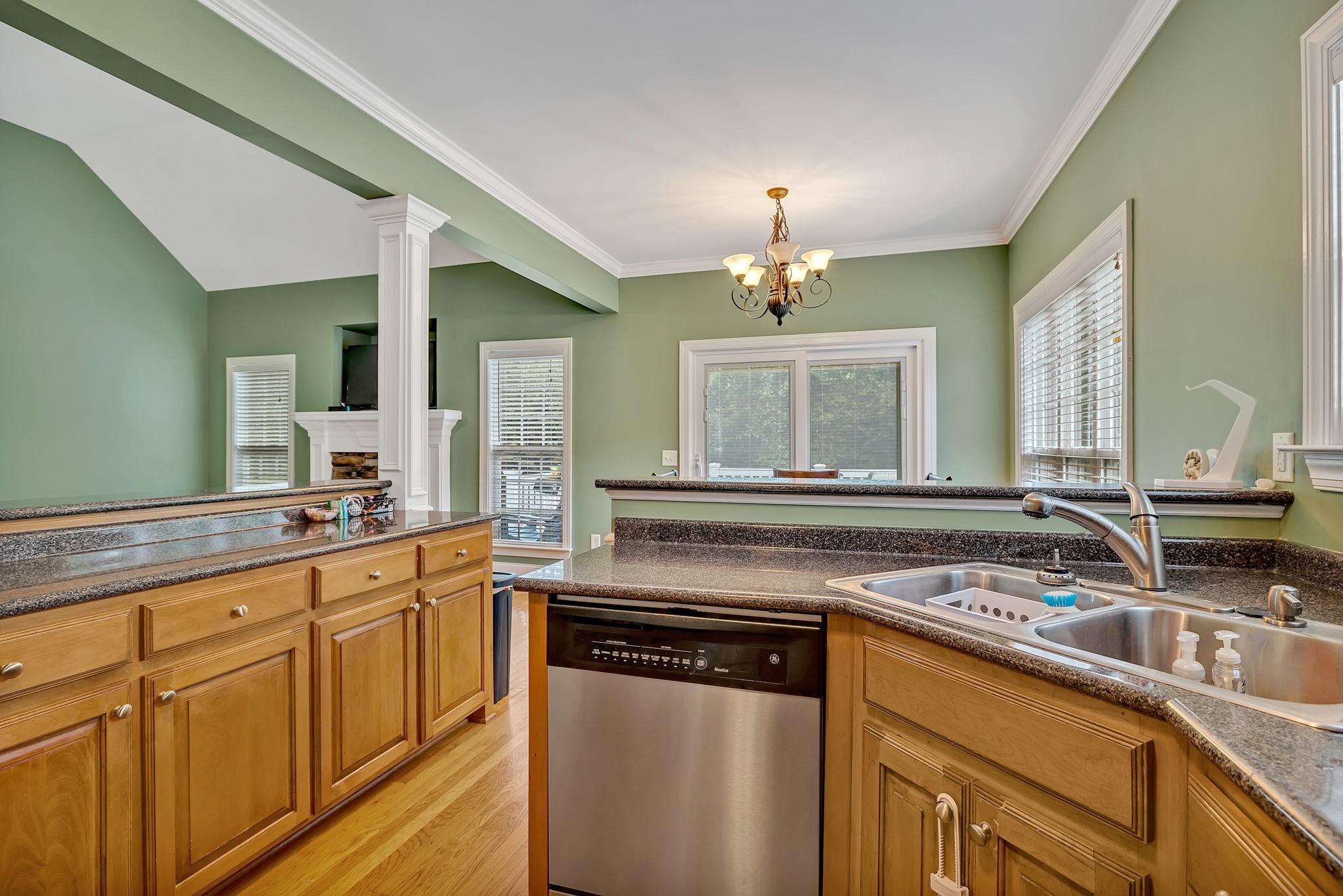 573 Summit Way Mount Juliet, TN 37122 - Photo 12 of 37 a kitchen with stainless steel appliances granite countertop a sink stove and cabinets