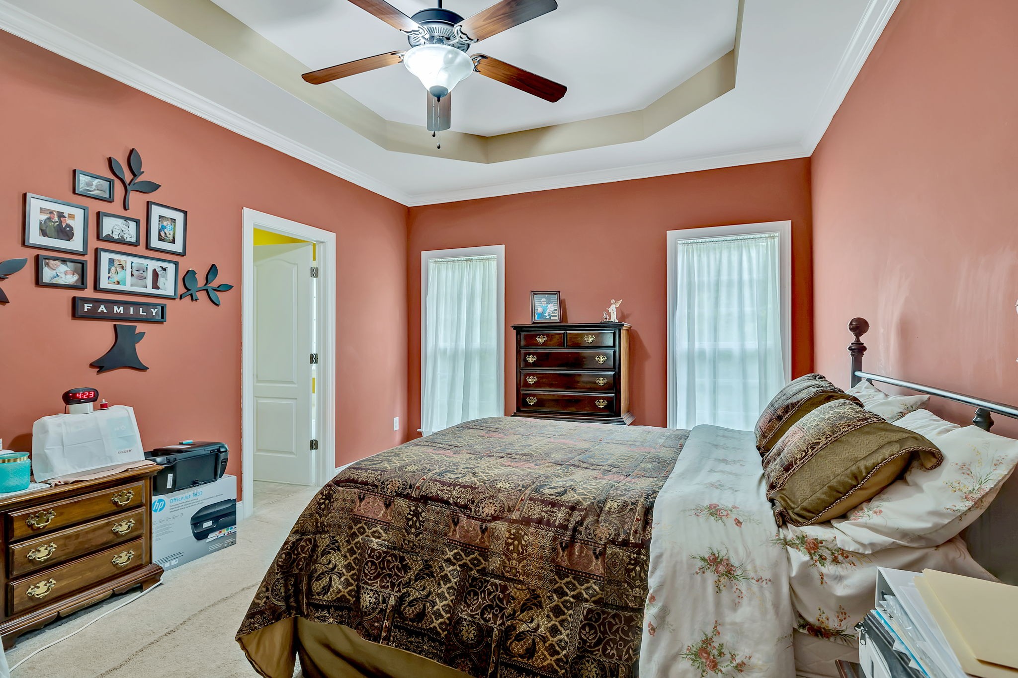 573 Summit Way Mount Juliet, TN 37122 - Photo 15 of 37 a bedroom with a bed and a chandelier