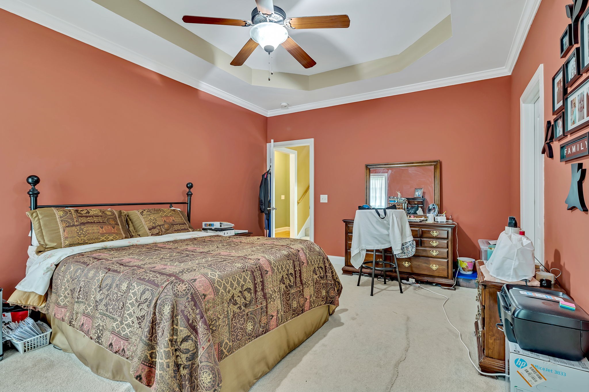 573 Summit Way Mount Juliet, TN 37122 - Photo 16 of 37 a bedroom with a bed gym equipment and a chandelier