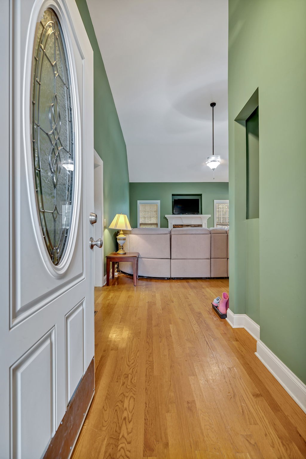 573 Summit Way Mount Juliet, TN 37122 - Photo 2 of 37 wooden floor with furniture and a fireplace