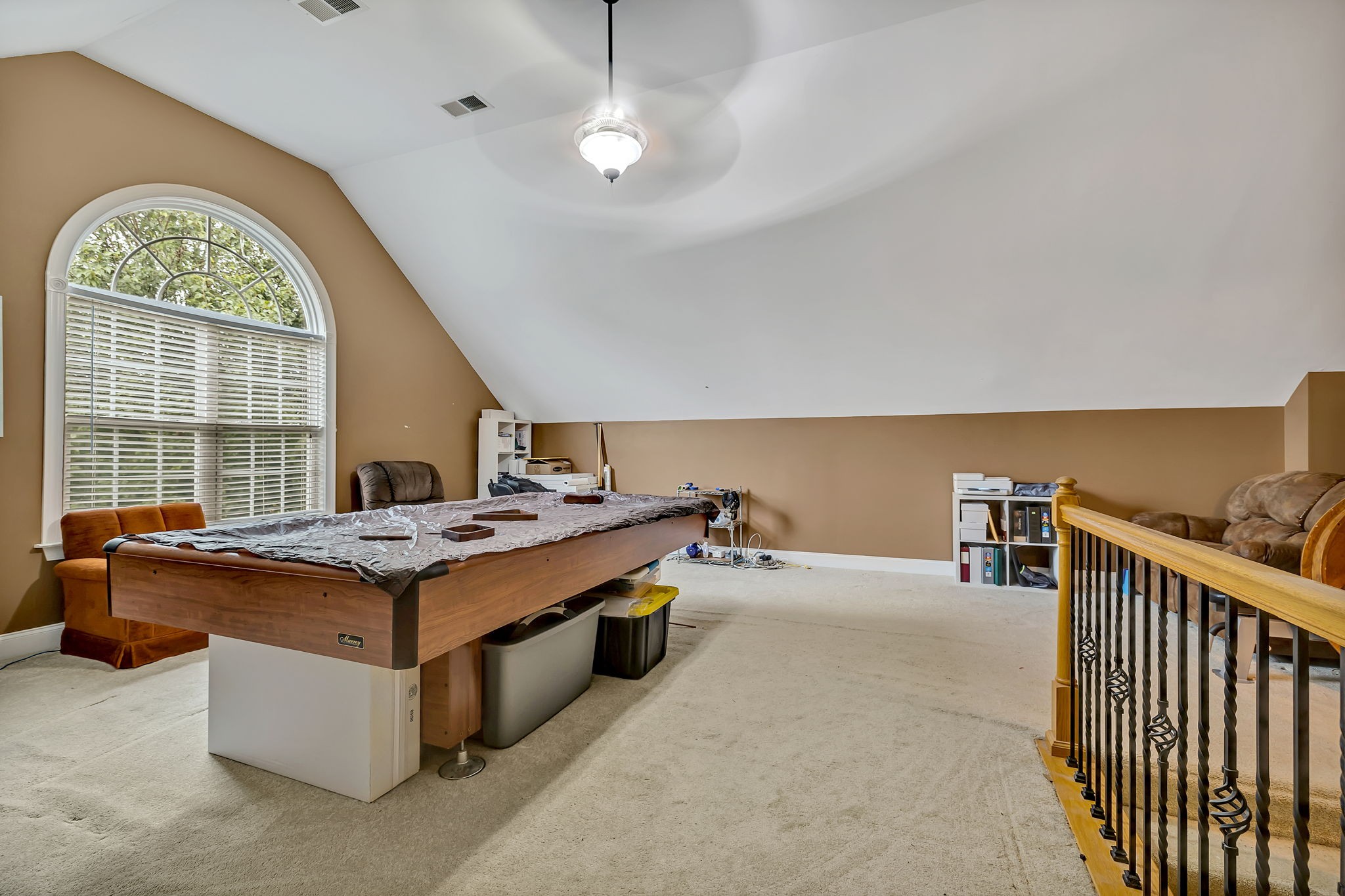 573 Summit Way Mount Juliet, TN 37122 - Photo 25 of 37 a living room with a stove and a large window