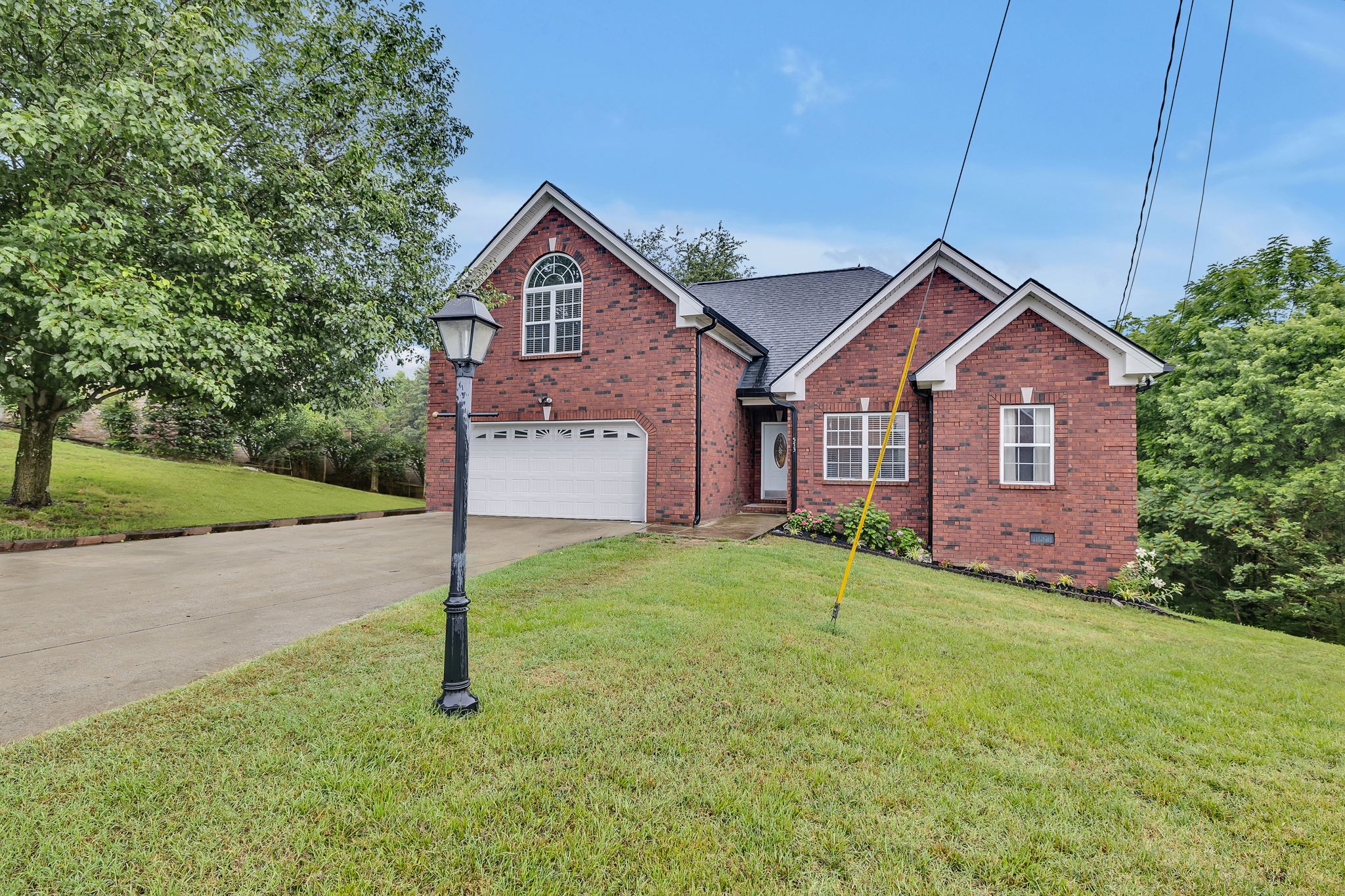 573 Summit Way Mount Juliet, TN 37122 - Photo 35 of 37 a front of a house with a yard