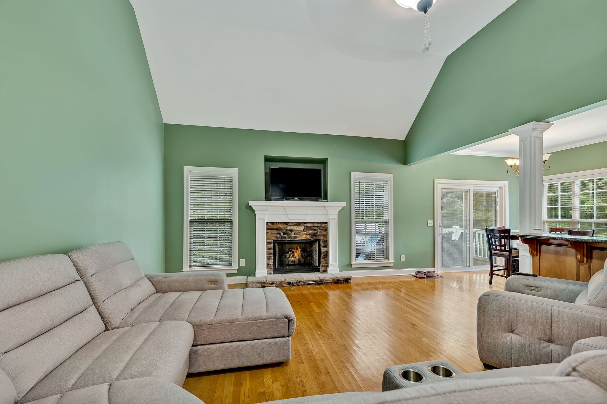 573 Summit Way Mount Juliet, TN 37122 - Photo 4 of 37 a living room with furniture and a fireplace