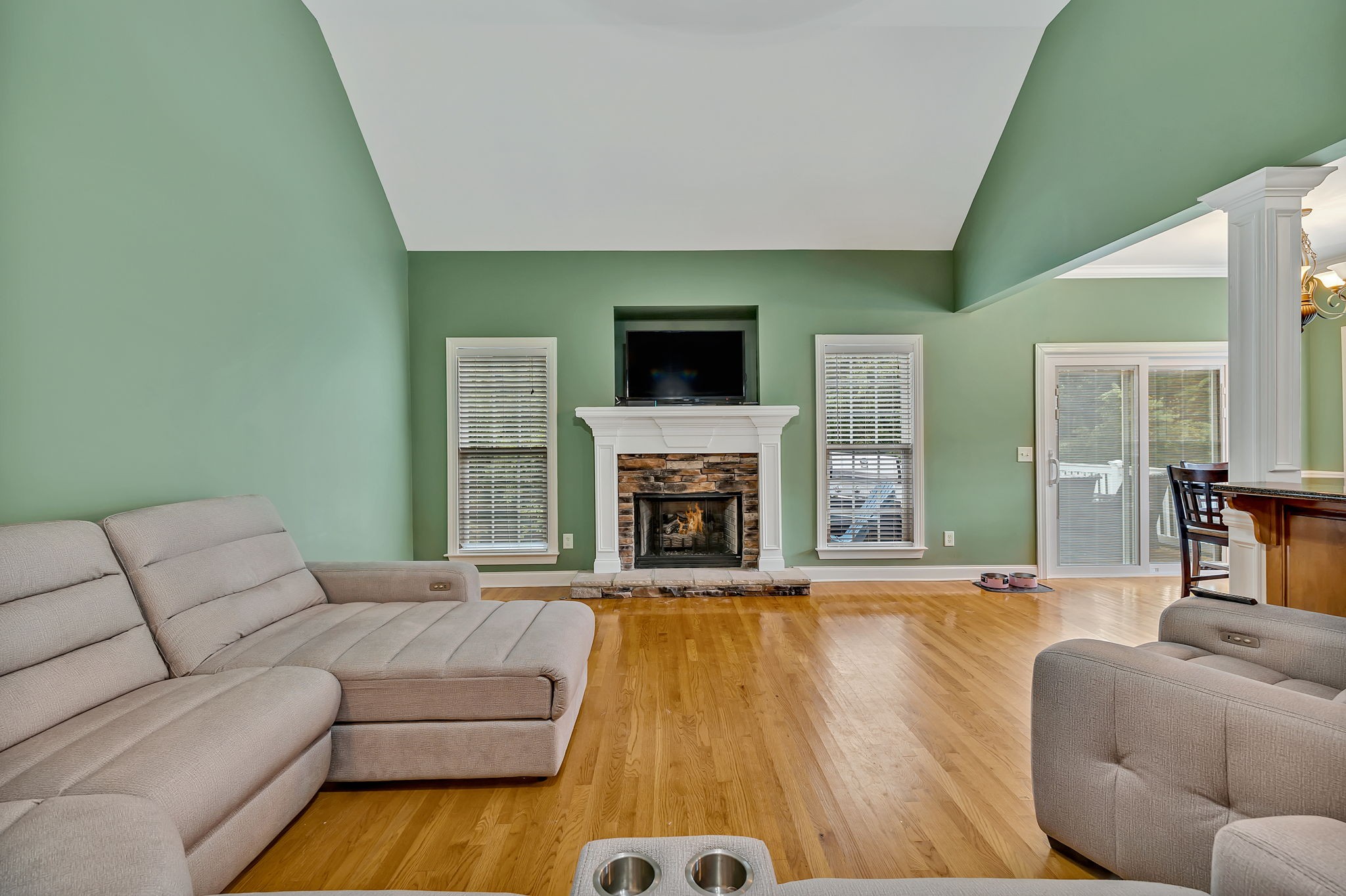 573 Summit Way Mount Juliet, TN 37122 - Photo 5 of 37 a living room with furniture and a fireplace