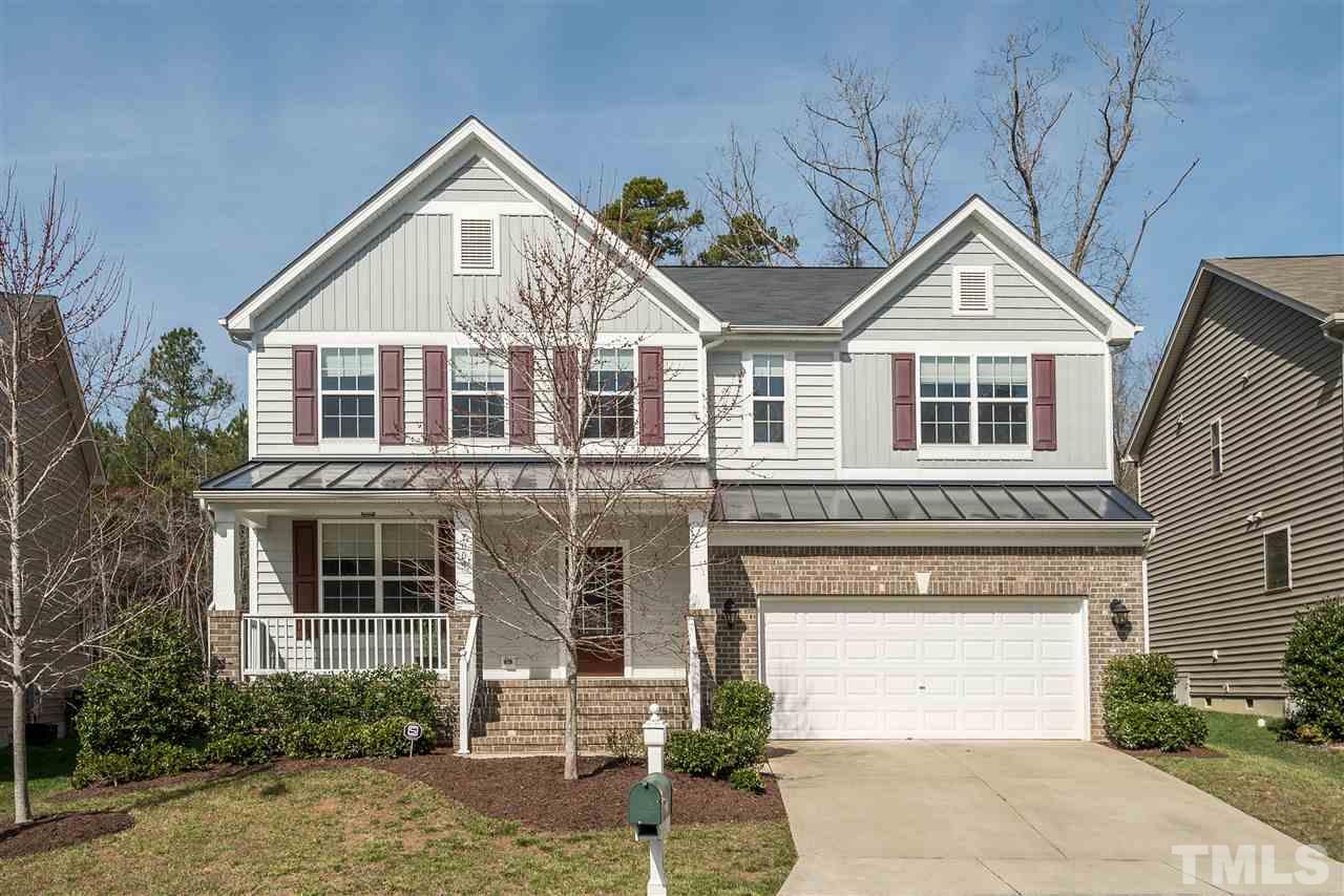 1004 Lakeview Road Durham, NC 27712 - Photo 1 of 25 a front view of a house with yard and parking